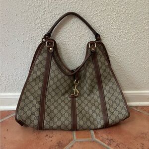 Vintage Gucci hobo joy shoulder bag in signature monogram canvas
